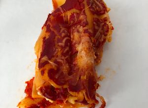 Une photo de Cannelloni à la ricotta, poivron et chorizo