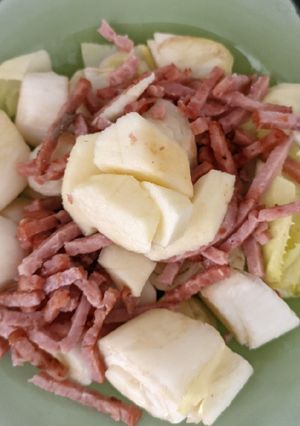 Une photo de Salade endives pommes bacon