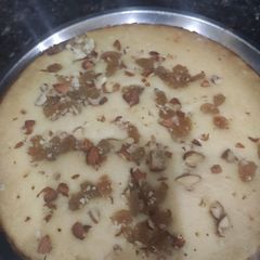 A picture of Suji cake in kadai.