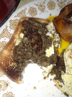 A picture of Ring Liver Sausage with Eggs and Toast.