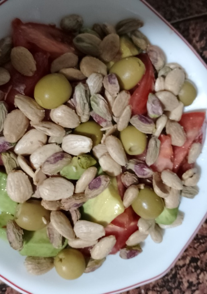 Una foto de Ensalada de almendras y pistachos