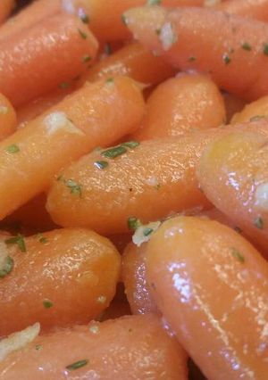 A picture of Buttered Carrots w/ Ginger & Rosemary.