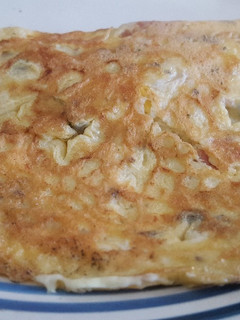 Una foto de Omelette de jamón, mozzarella y especias
