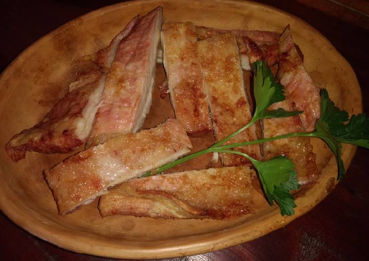 Matambrito al horno con crema de palta y reciclado de paella