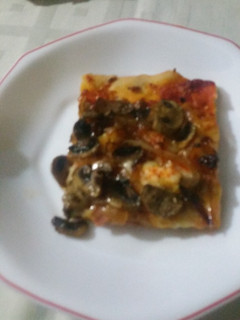 Una foto de Pizza de langostinos