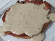Una foto de bechamel de queso queso crema