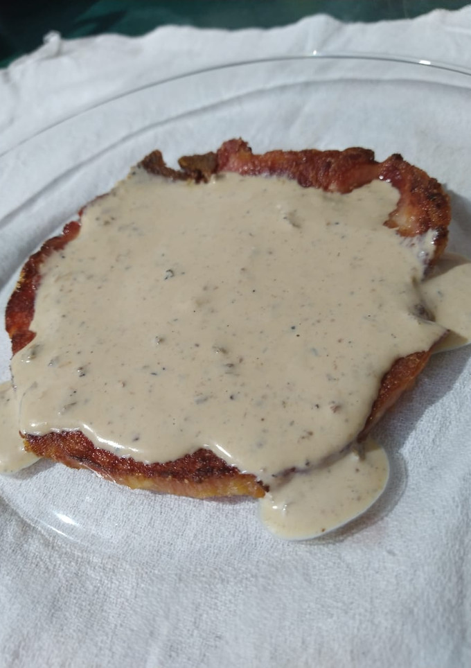 Una foto de Chuletas con salsa bechamel