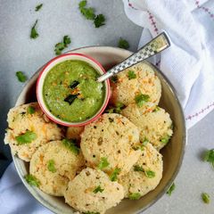 A picture of Masala Veg Idli with Peanut coriander Chutney.
