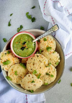 A picture of Masala Veg Idli with Peanut coriander Chutney.