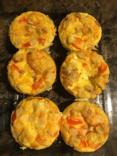 A picture of Scrambled eggs in a Muffin Tin.