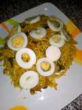 Spaghetti joloff with boiled egg