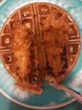 Chicken and waffles with red chili flake and honey