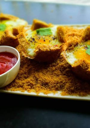 A picture of Eggs In Baked Basket.