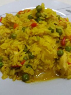 Una foto de Arroz caldoso con pollo