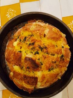 Una foto de Pan relleno de quesos