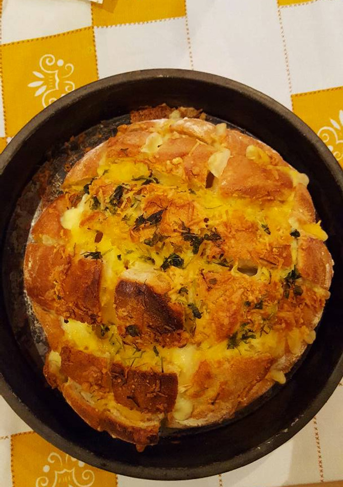 Una foto de Pan relleno de quesos