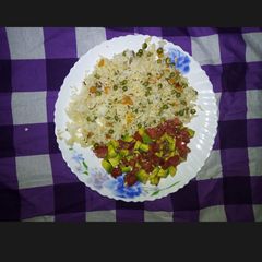 A picture of Vegetable Rice and guacamole.