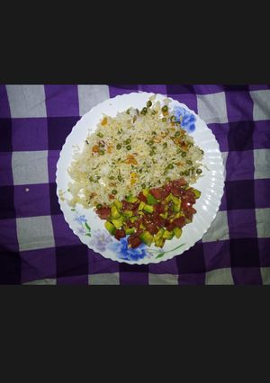 A picture of Vegetable Rice and guacamole.