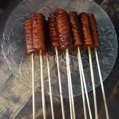 A picture of Sosis Bakar Batu.