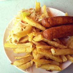 Fries with sausages Salad A picture of Fries with sausages Salad.