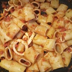 A picture of Mezzi paccheri con calamari al cartoccio.