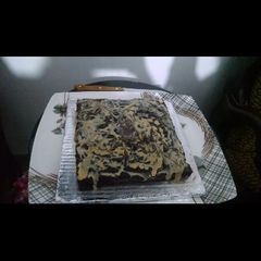 A picture of 7 spoon chocolate cake.