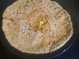 बाजरीची तीळ लावलेली भाकरी (Bajrichi Til Lavleli Bhakri Recipe In Marathi)