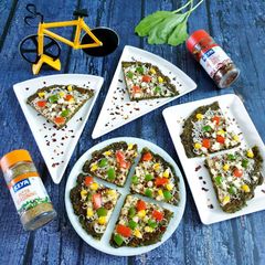 A picture of Palak paneer pizza.