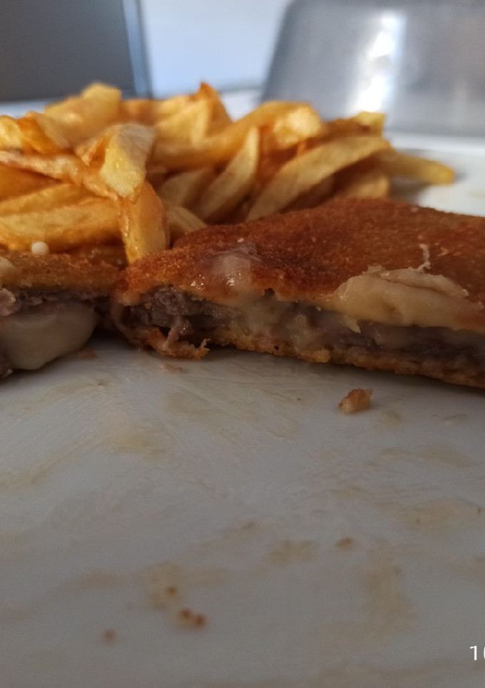 Una foto de Libritos de ternera rellenos de jamón York y queso