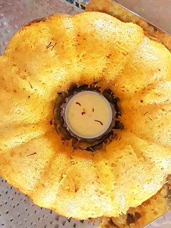 A picture of Tacheen-Persian Rice Dish.