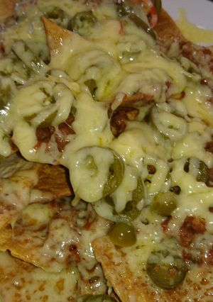 A picture of Nachos With Salsa, Jalapeño Peppers & Cheese.