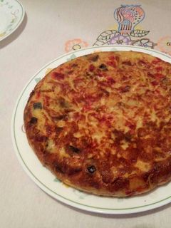 Una foto de Tortilla de patatas con verduras