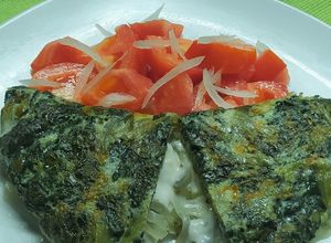 Una foto de Omelette De Vegetales, Queso Y Cebolla