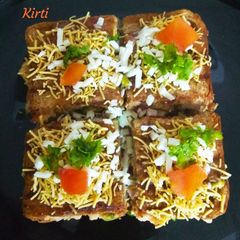 A picture of Sprout & Veggie Chaat Club Sandwich.