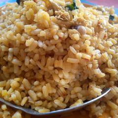 A picture of Traditional egg veg beans and rice.
