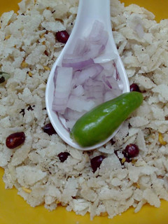 A picture of Fried poha chiwda(flattened rice).