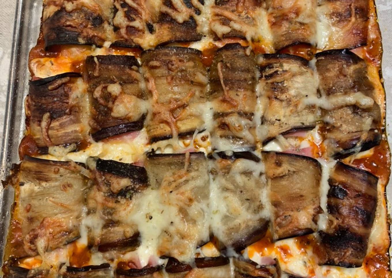 Berenjenas con jamón y queso