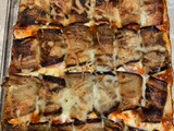 Berenjenas con jamón y queso
