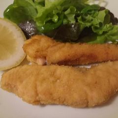 A picture of Pan fried breaded salmon.
