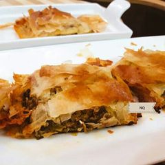 A picture of Spinach filled Phyllo Rolls.