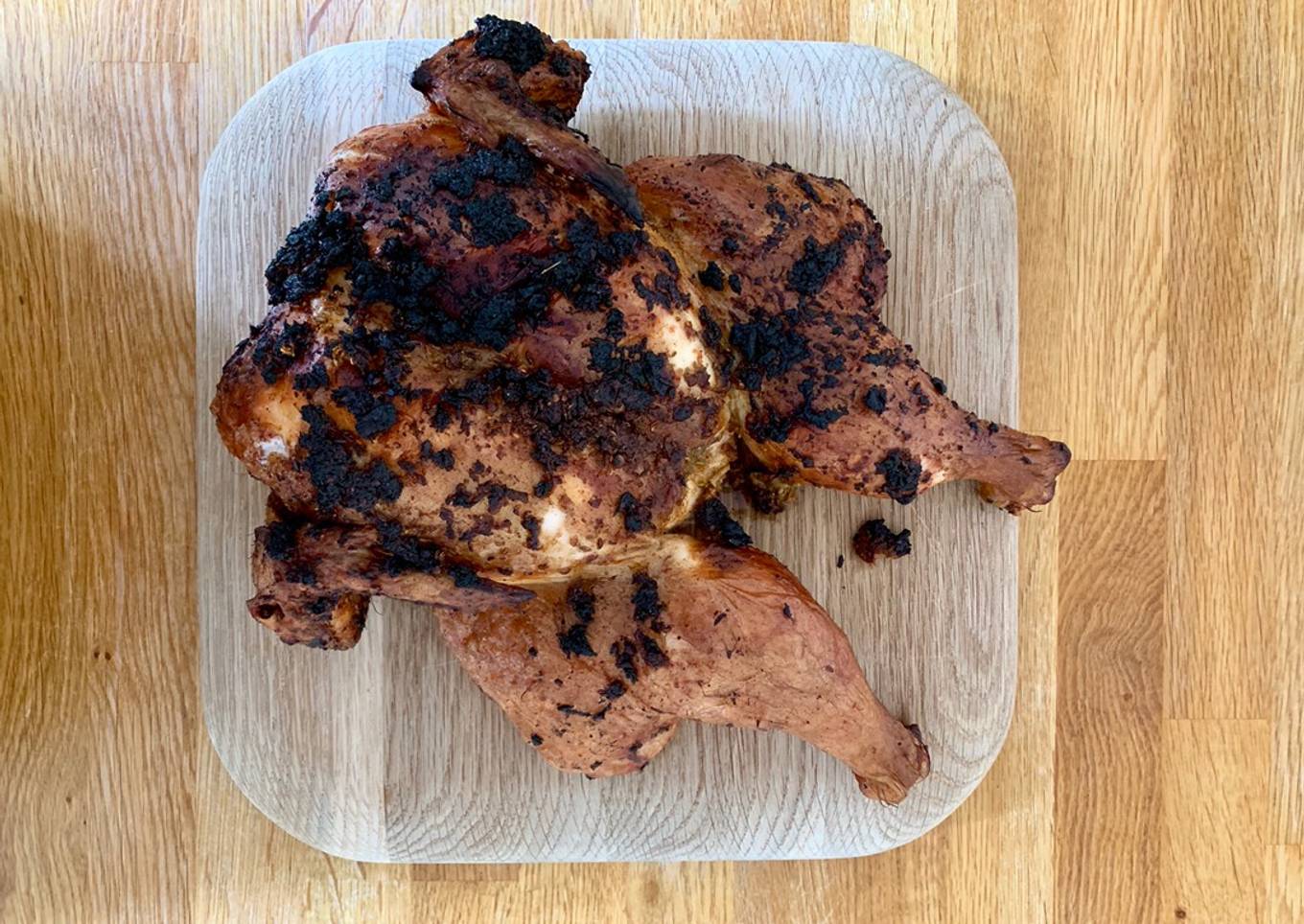 Blackened spatchcock chicken on the braai