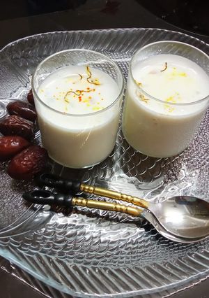A picture of Saffron badam sharbat with milk.