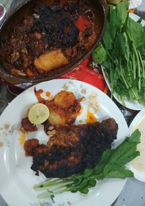 صورة لوصفة شرائح اسماك القرش بالبطاطس والطماطم🍅