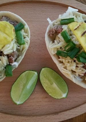 A picture of Orzo Burger Taco Boat.