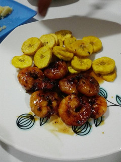 Una foto de Langostinos a la miel y jengibre
