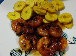 Una foto de Langostinos a la miel y jengibre