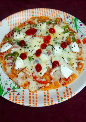 पनीर पैन पिज़्ज़ा (Paneer pan pizza recipe in Hindi) रेसिपी मुख्य फोटो