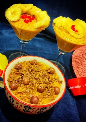 A picture of Doodh daliya in pressure cooker (with different toppings).