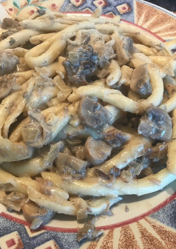 Una foto de Pasta con salsa de setas y Foie