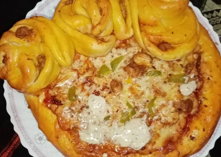 Recipe of Delicious Chicken Malai boti creamy floral pizza in pateela